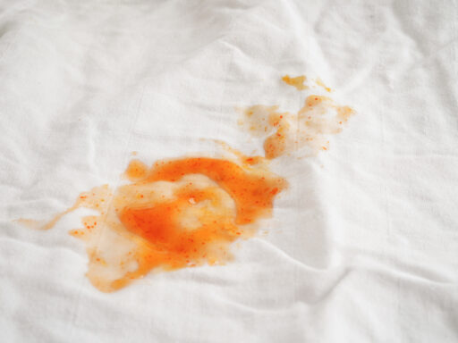 An orange stain spot on t-shirt